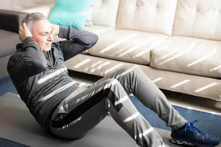 Man doing ab exercises at home