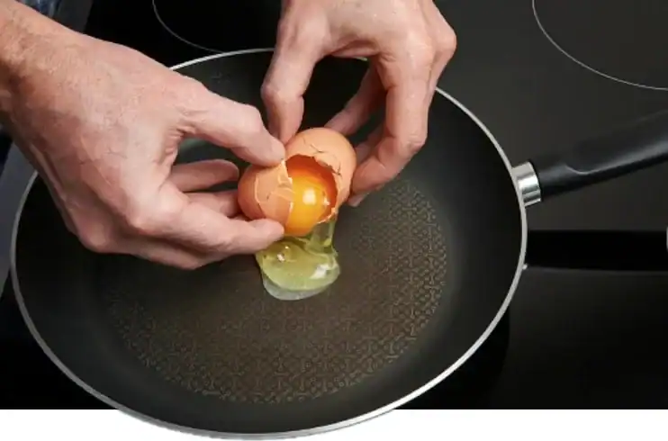 frying egg in a pan