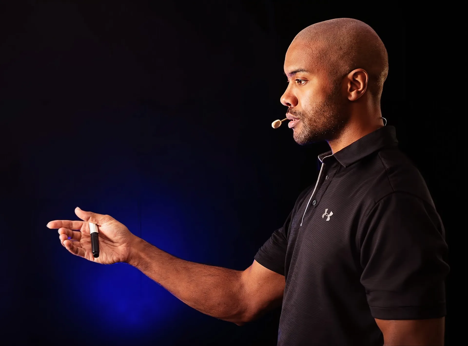 jay speaking on stage at corporate workshop