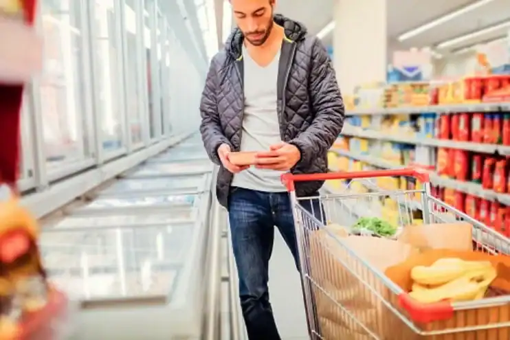 man shopping at food market
