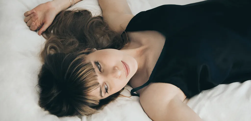Woman waking up for morning weight loss ritual